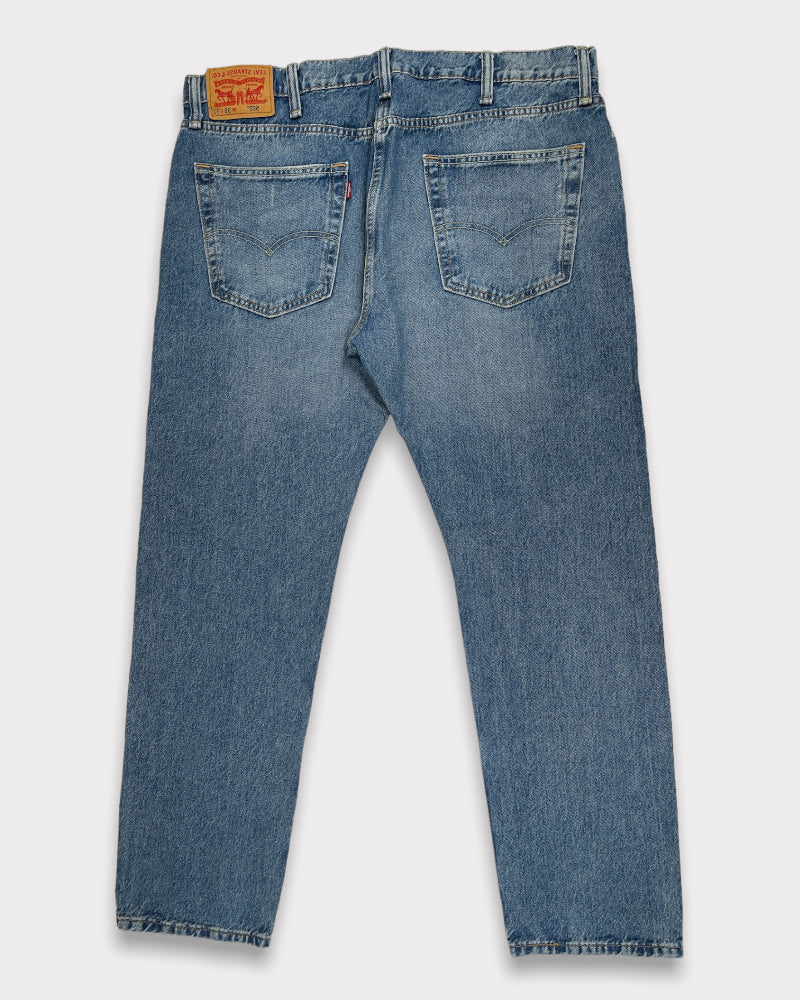 Levi’s Men’s 502 Ripped Light Wash Blue Jeans (W38)