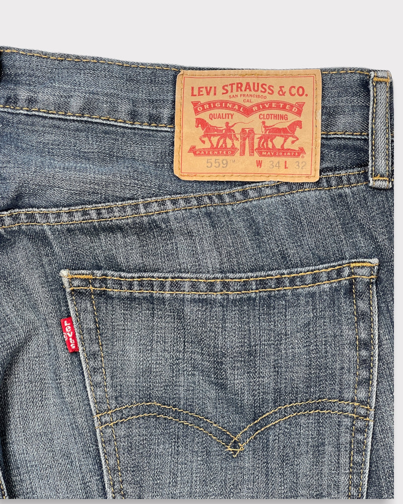 Levi's Men's 559 Faded Blue Jeans (W35)